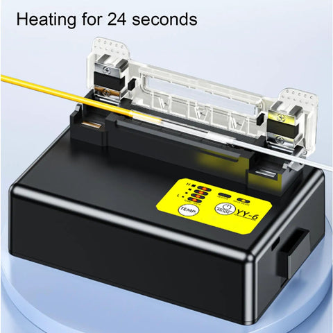 Cryfokt Splicer Heater W External Heat Shrink Tube Heating Furnace Rechargeable Li Ion Battery 5100Mah in use with heating indicator.