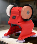 Compact Mini Bench Grinder 18V Battery Power on a table, featuring coarse and fine corundum wheels for buffing tasks.