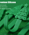Heavy Duty Christmas Adhesive Wall Hooks For Stockings And Garland Damage Free Clear Sticky Holders With Chill Out Setup For Sweet Grip Mantel Holiday Decoration, featuring green silicone hooks shaped like Christmas trees.