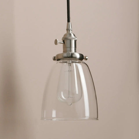 Close-up of one light from the Three Light Industrial Pendant Lighting for Kitchen Island with Oval Clear Glass Shades, Brushed Steel Ceiling Fixture