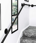 Heavy Duty Black Iron Wall Bracket Kit For Deck Railing With Beefy Guardrail Support And No Sweat Homeowner Assembly Adjustable Span For Indoor Outdoor Projects Game Changer Backyard Upgrade installed along staircase wall.