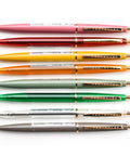 Various color pens including the Ultra Smooth Oil Based Ballpoint Pen With Ultra Low Viscosity Mach Ball Ink 0.5mm Extra Fine Tip Forest Green Retro Design Made In Japan Slick Colors For Everyday Journaling Sketching And Precise Notes.