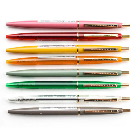 Various color pens including the Ultra Smooth Oil Based Ballpoint Pen With Ultra Low Viscosity Mach Ball Ink 0.5mm Extra Fine Tip Forest Green Retro Design Made In Japan Slick Colors For Everyday Journaling Sketching And Precise Notes.