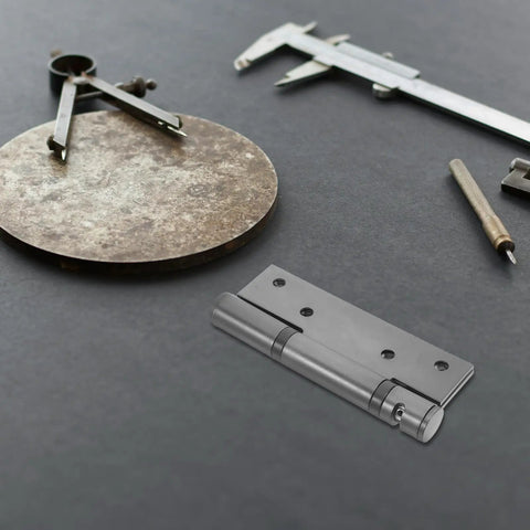 Hidden Stainless Steel Door Hinges For Wood Doors, Hydraulic Self-Closing with 90 Degree Positioning displayed with tools