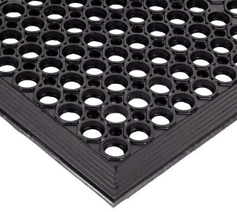 Close-up of anti fatigue drainage rubber matting for indoor and outdoor use built tough, heavy duty non slip floor mats for workshops.