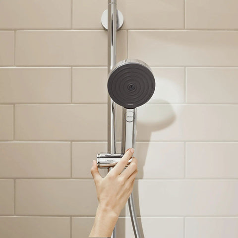 Pulsify S 24 Inch Wall Bar Shower System With 3 Jet Types PowderRain, 2.5 GPM Handheld Shower Head, in chrome, being adjusted by hand.