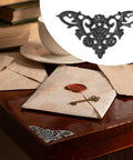 Rock Solid Antique Bronze Corner Protectors With 20 Pack Decorative Metal Edge Guards For Books Photo Frames Wooden Crates Straight Up Vintage Charm Real Deal Scratch Shield on a wooden table with letters and a key.