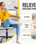 Woman sitting on chair using Gel Memory Foam Chair Cushions Set Of Four With FadeShield Water And Stain Resistant Finish, indoor use