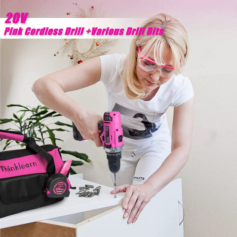Woman using Pink 175 Piece 20V Cordless Drill Tool Set For Women with Large Capacity Storage Bag, DIY home repair