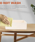 Hand cleaning a Foldable Beige Closet Storage Basket Straighten Your Space Fast Soft Polyester Cotton Linen Drawer Organizer.