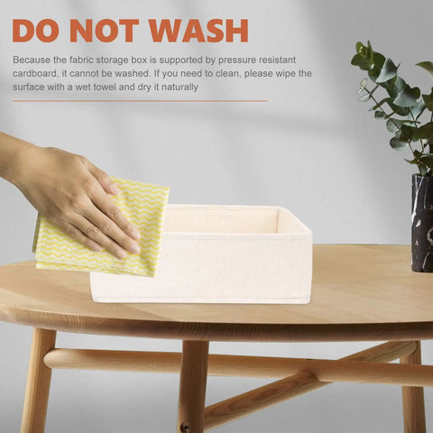 Hand cleaning a Foldable Beige Closet Storage Basket Straighten Your Space Fast Soft Polyester Cotton Linen Drawer Organizer.