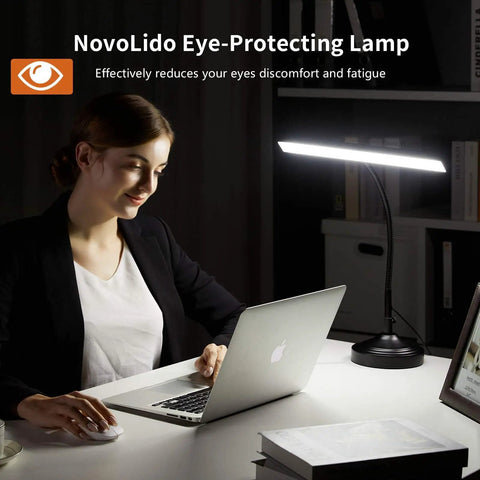 Woman working at desk with Two In One Piano Desk Lamp With Flexible Gooseneck And Clamp Base, 10W LED Piano Light, memory function.