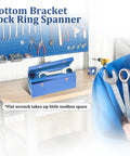 Bottom Bracket Tool For Cup And Cone Bicycle Bottom Brackets Double Sided Lockring Wrench in blue toolbox on workbench