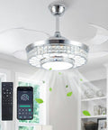 42 Inch Retractable Ceiling Fan With Bright Lights, Smooth App Controlled Crystal Chandelier in a modern living room.