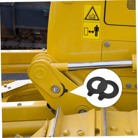 Two Piece Excavator Pin Shim Kit With Durable Round Rubber Washers For Easy Replacement Compatible With Boom Pads Reducing Noise And Vibration In Industrial Machinery, close-up on excavator pin