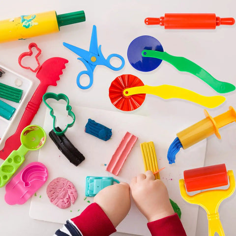 Child playing with 9-Piece Dough And Clay Tools Starter Set For Kids With Rollers, Pizza Cutter, Rolling Pins, Safety Scissors