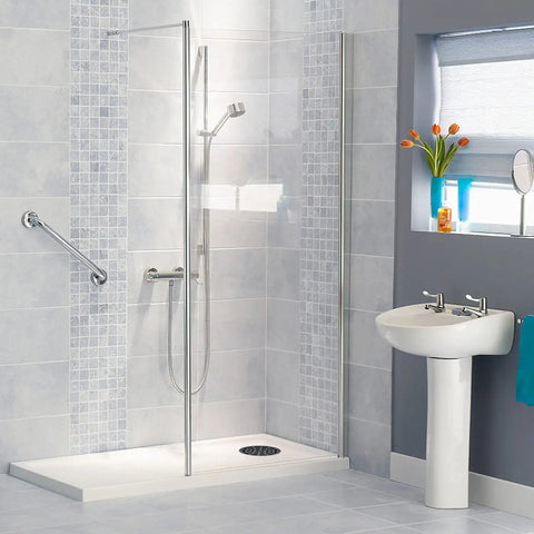 Four And A Quarter Inch Round Shower Drain In Matte Black Stainless Steel with Flange Kit on bathroom floor