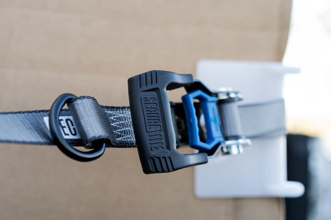 Close-up of ratchet handle on Beefy 4 Pack Ratchet Tie Down Straps One And One Quarter Inch By 16 Foot With Vinyl Double J Hooks