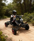 Powerful 2000W Electric Go Kart for Adults and Kids with 30 MPH Off Road Speed, 6 Inch All Terrain Tires on a dirt trail
