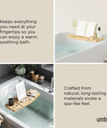 Aquala Extendable Bathtub Tray Caddy With Book Stand And Wine Glass Holder Phone Stand on bathtub, natural finish.