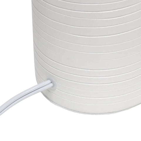 Textured Linear Ceramic Table Lamp In Off White With White Fabric Shade Pottery Style Cozy Vibe Uses 60W A19 Bulb close-up of ceramic base and cord