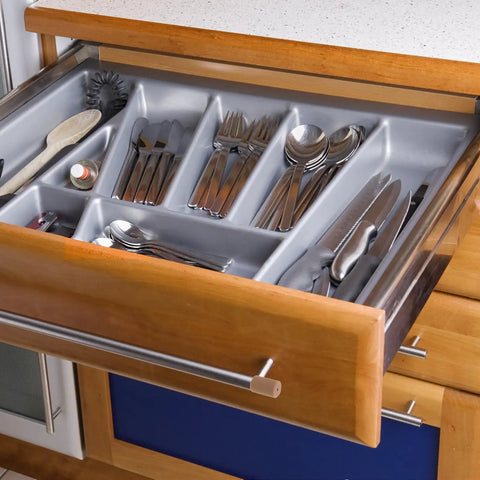 Open drawer showing cutlery with Brown Silicone Corner Guards For Furniture And Drawer Handles Soft Round Edge Protectors visible.