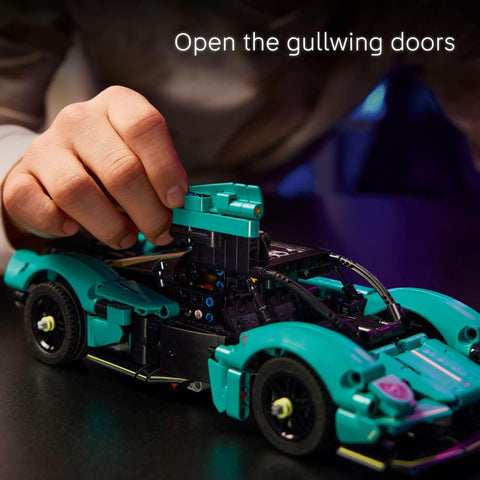 Child assembling Aston Martin Valkyrie Dope Building Kit For Kids 9 Plus with realistic engine and working gears, doors open