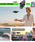 Man controlling Ultra Foldable Drone With Optical Flow Positioning And 720P HD Camera Six Channel Flight Stability Gyro Based Stabilization For Smooth Hover Ultra Portable Design Includes Three Batteries For Grab And Go Aerial Fun in desert.