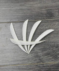 Top Notch Turkey Feather Fletching For Arrows 4 Inch Or 5 Inch Right Wing White 50 Pack displayed on wooden surface