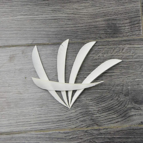 Top Notch Turkey Feather Fletching For Arrows 4 Inch Or 5 Inch Right Wing White 50 Pack displayed on wooden surface