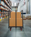 Heavy Duty Steel Panel Truck Cart Built To Haul 1000 Lbs With Four Swivel Casters Wood End And Three Side Handrails For Easy Moving And Reliable Load Transport loaded with boxes in warehouse
