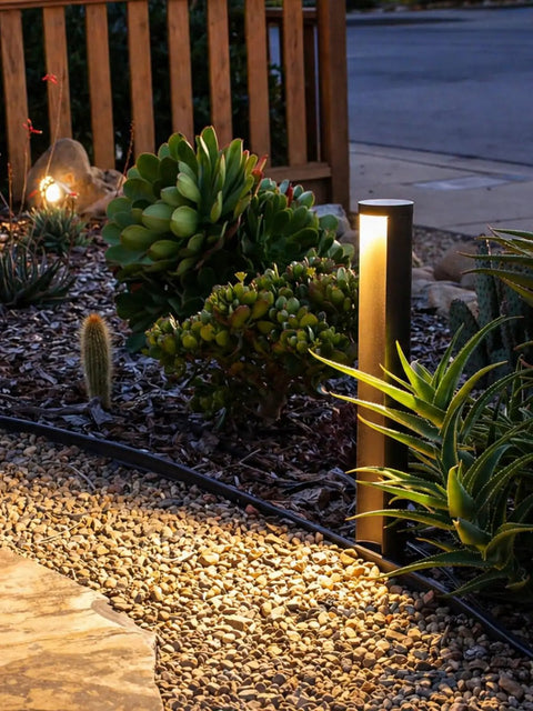 Low Voltage 5W Anti-Glare LED Path Lights With 5CCT Color Temperatures lighting a gravel garden path by plants at night
