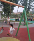 Child on swing set secured with 4400 Lbs Heavy Duty Swing Hanger Kit With Eye Bolt Hooks For Porch Patio Tree And Playground Swings