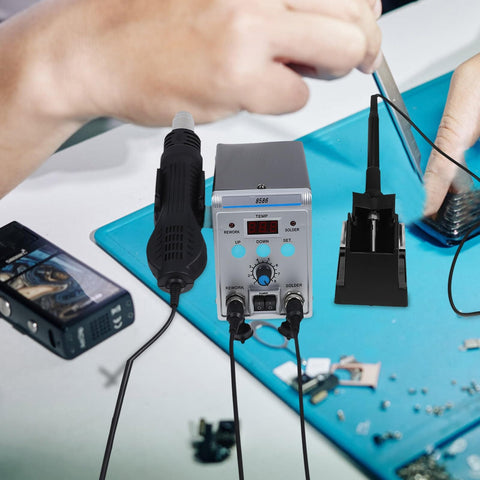 Pro Grade Digital Display Soldering Iron Station Kit with Hot Air Rework on workbench for PCB maintenance.