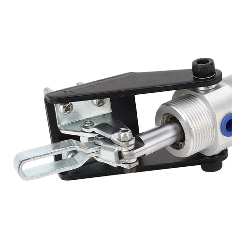 Close-up of Tested Pro Pneumatic Hold Down Clamp with aluminum and steel components for precision clamping on workbench.