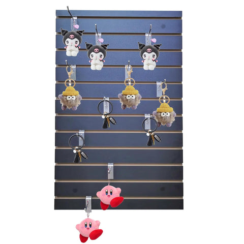 24X36 Inch Black Slatwall Panel For Home Garage And Retail Displays With Three Inch On Center Grid holding plush toys and keychains