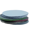 50 Pack Premium Round Wet Dry Sanding Discs Grit 1000 To 5000 for polishing stacked in a neat arrangement for various surfaces.