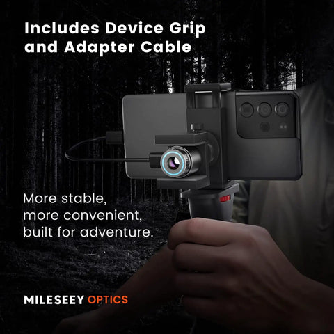 Night Vision Thermal Monocular For Android TNV30i with device grip and adapter cable for stable usage in outdoor settings.