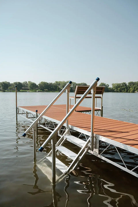 Heavy Duty Aluminum Dock Stairs With Five Wide Platforms And Twin Handrails for easy shoreline climbing by the water.