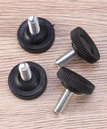 Badass Heavy Duty Adjustable Furniture Levelers With Tee Nuts Kits black steel and rubber pads, close-up of leveling feet.