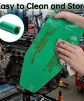 Flexible Silicone Oil Change Funnel Set Bendable Foldable Spill Free With Magnetic Drain Plug Tool being cleaned in a garage
