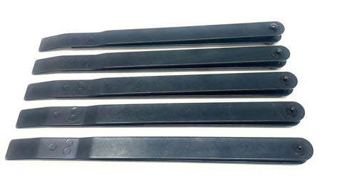 Flat lay of five black metal 6-inch hole-finder strap duplicator tools arranged in a row