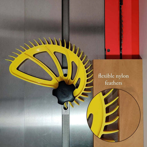 The Hedgehog featherboard for table saws, yellow wheel with flexible nylon feathers, front view.