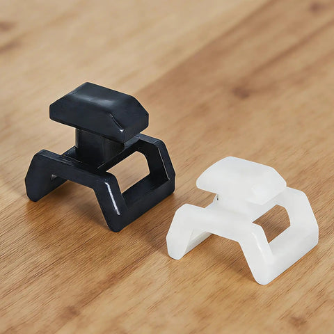Black and white clips from 20 Pcs Series Cable Clips For European T Slot Aluminum Profiles And 3030 4040 Extrusions on wood surface