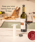 Original Saver Wine Bottle Stopper Set With Pump and 2 Vacuum Stoppers Keeps Red and White Wine Fresh Up To 10 Days, shown with wine bottle