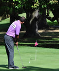 Golfer using 35 Inch Right Handed Golf Putter For Men With Rubber Grip Blade Design on green