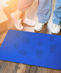 Pro Heavy Duty Sticky Rubber Tacky Mats 24 By 36 Inches Blue Floor Mats For Workshops And Garages Snag Dust And Grime Like A Champ 300 Sheets showing foot prints.