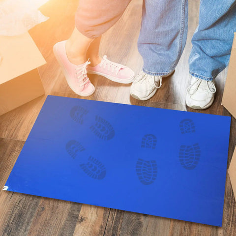 Pro Heavy Duty Sticky Rubber Tacky Mats 24 By 36 Inches Blue Floor Mats For Workshops And Garages Snag Dust And Grime Like A Champ 300 Sheets showing foot prints.