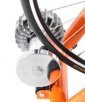 Close-up of fluid resistance mechanism on Orange Fluid Bike Trainer Pro Indoor Bicycle Training Stand For Serious Rides