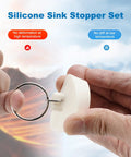 Close-up of Six Size Universal Drain Stopper Set With Pull Ring Rubber Sink Plugs For Kitchen Bath Laundry And Tub That Easily Fits Seven Eighths Inch To Two Inches Across Six Sizes White.